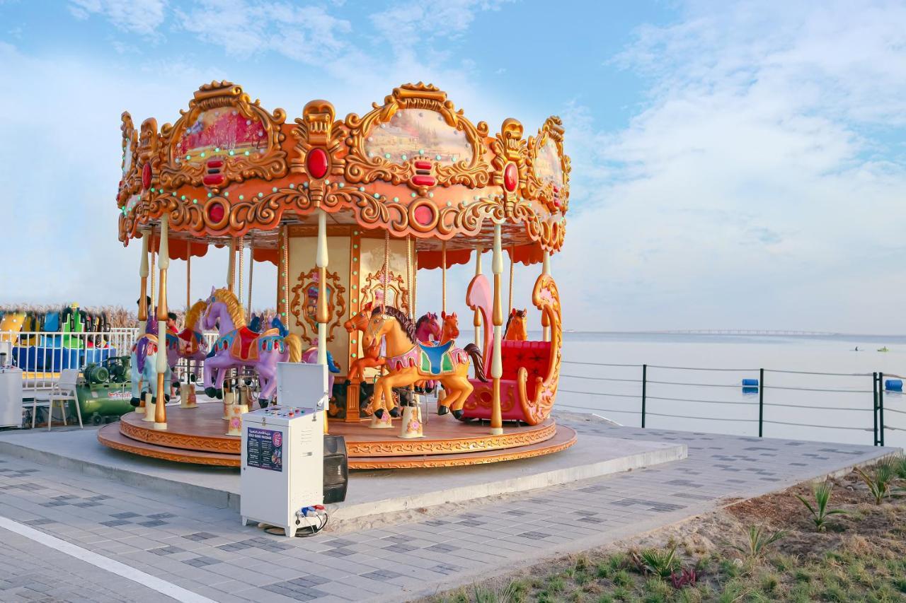 Lagoona Beach Luxury Resort And Spa Al-Manamah Bagian luar foto A carousel in Pattaya, Thailand